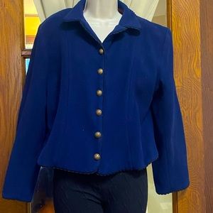 Vintage Royal Blue with brass buttons, and scalloped piping.  100% wool blazer